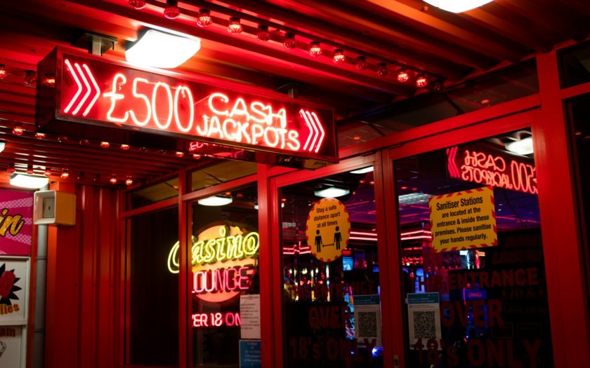 red and white coca cola neon signage